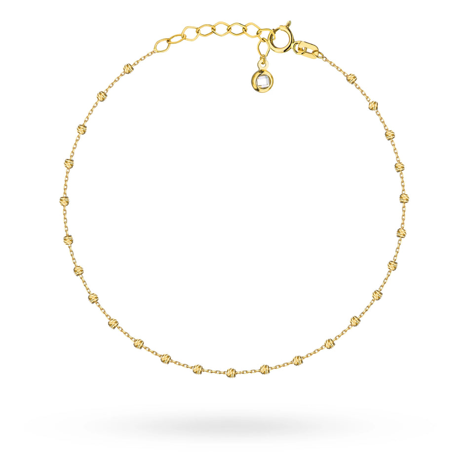 Zlatý náramek s korálky