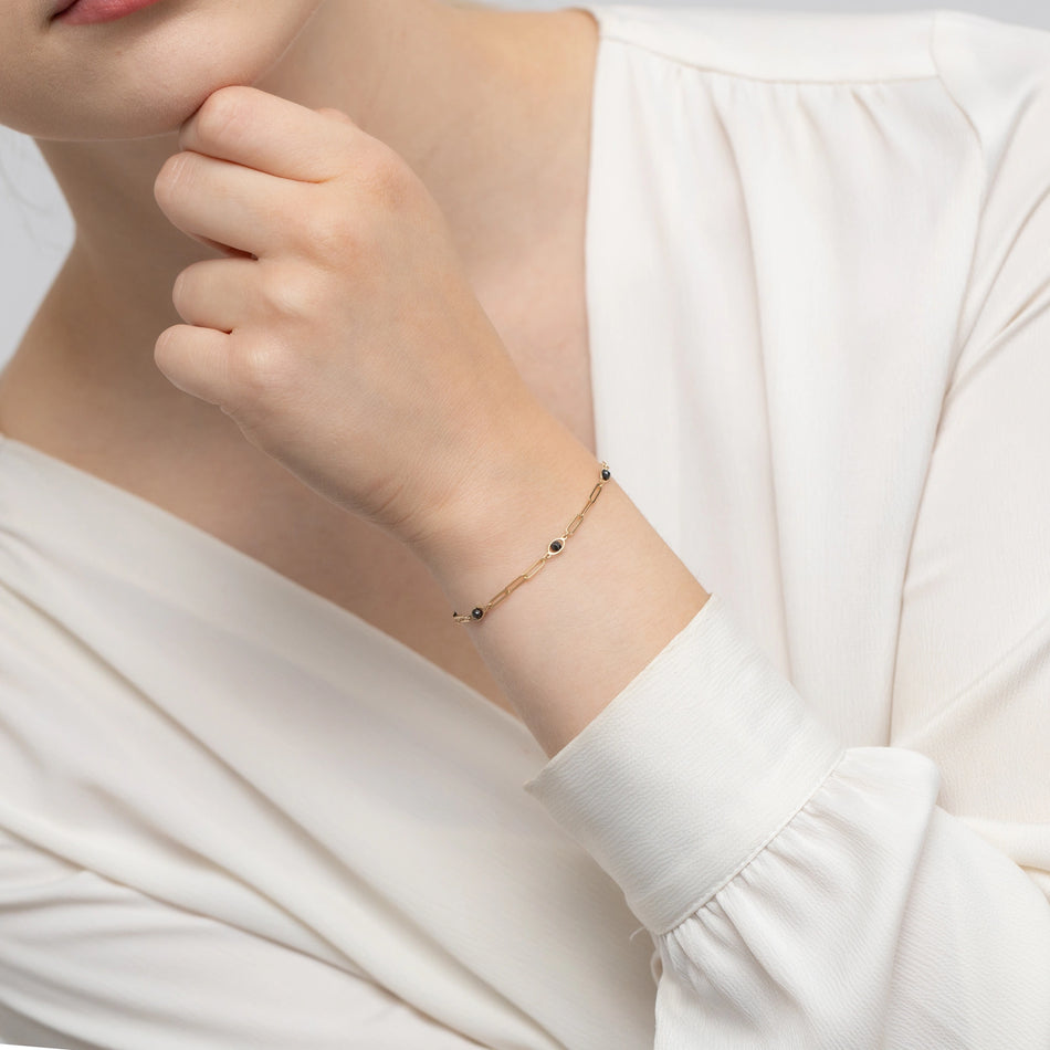 Gold Bracelet with Links and Black Zirconia