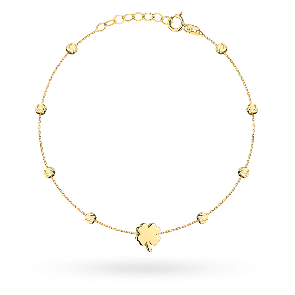 Zlatý náramek se čtyřlístkem a korálky