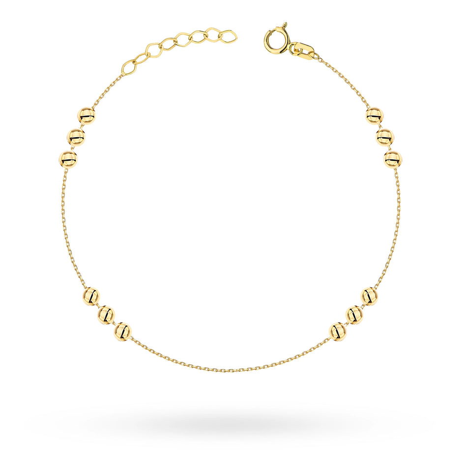 Zlatý náramek s korálky