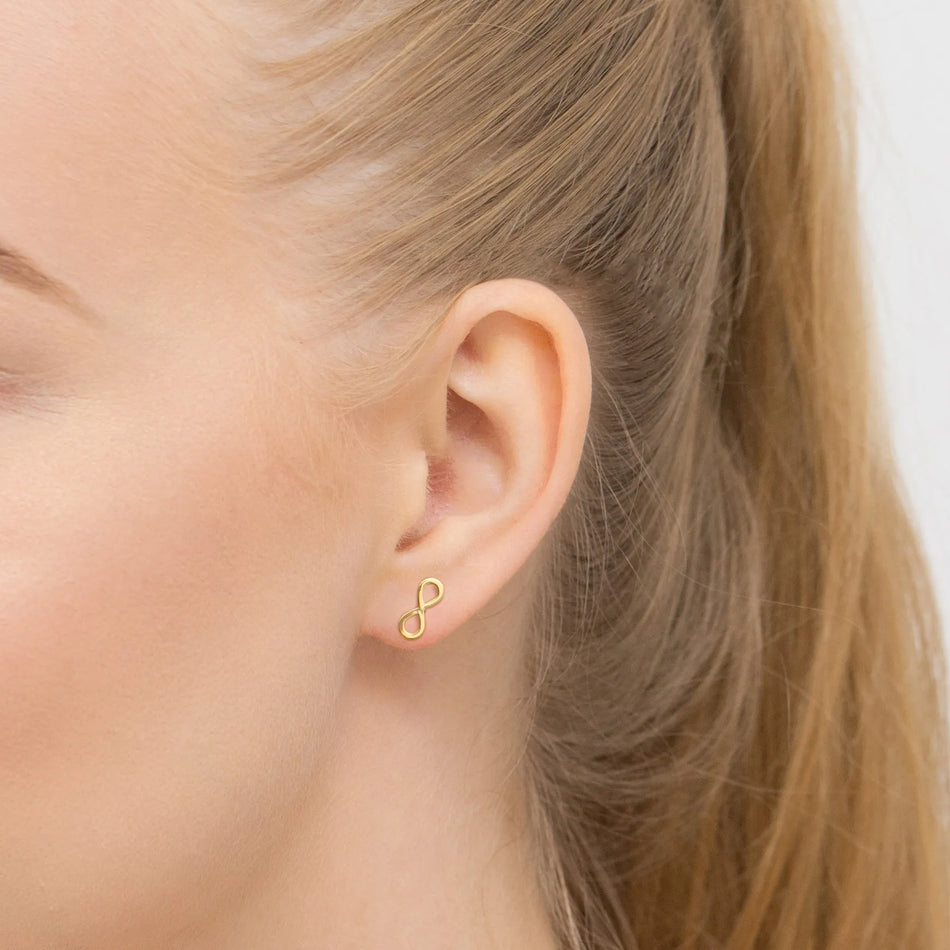 Zlaté puzety náušnice Infinity