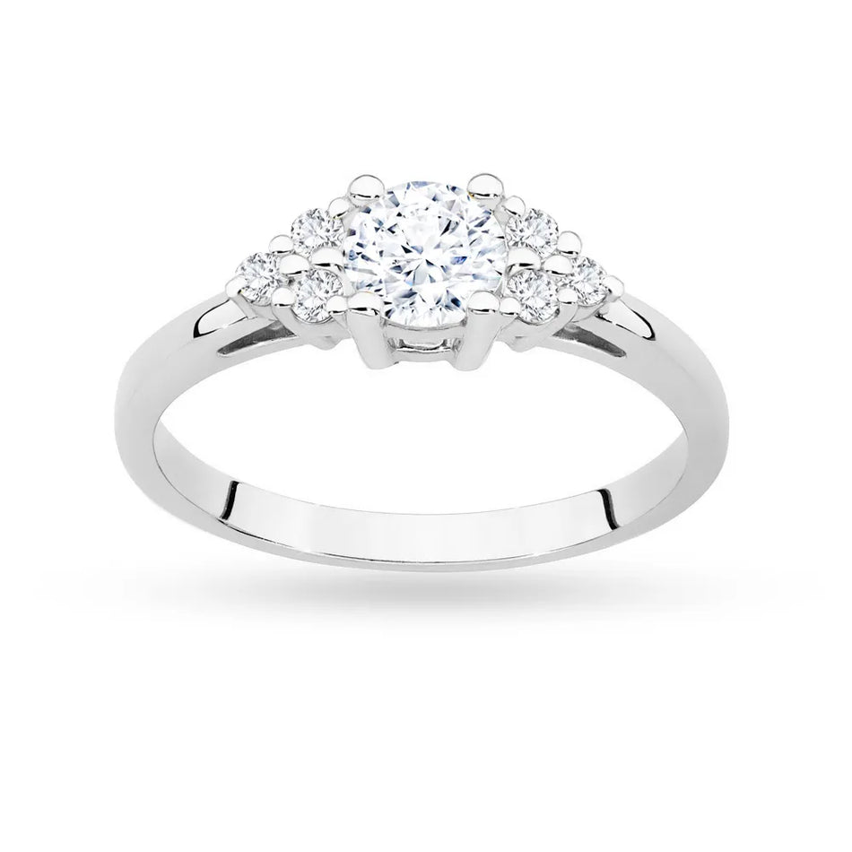 Gold Ring with 0,60ct White Sapphire and 6 Diamonds