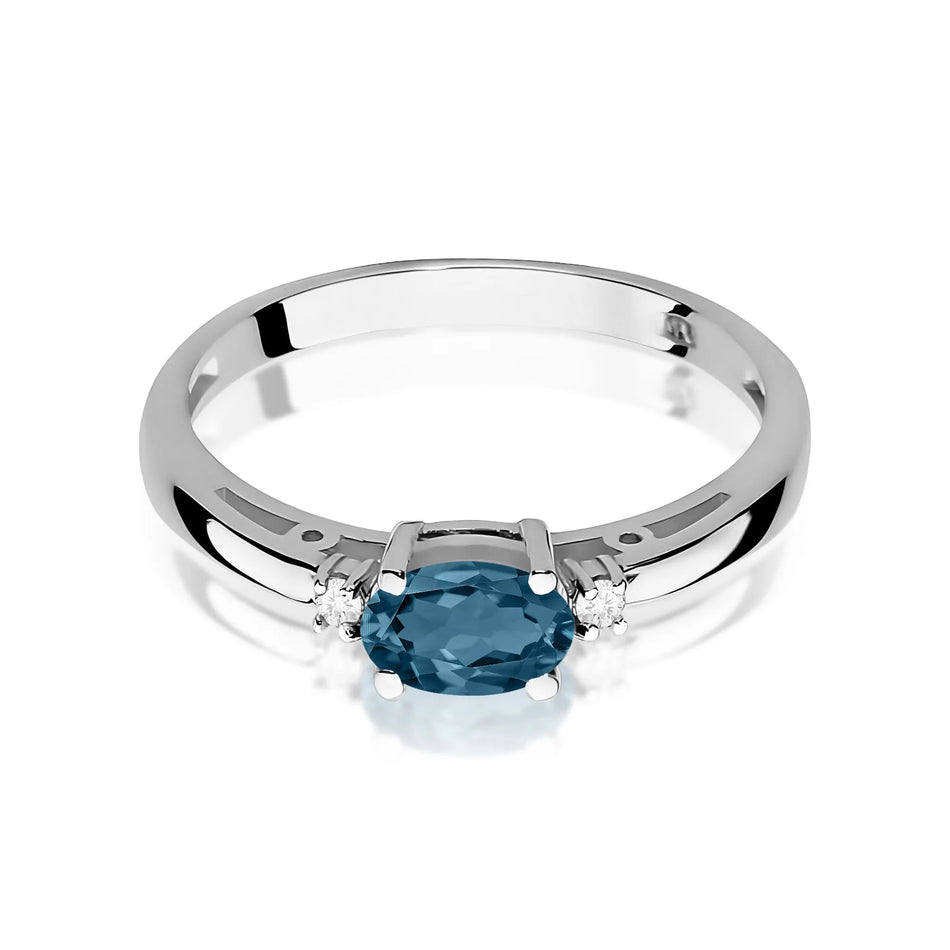 Zlatý prsten s 0,50ct topazem London Blue a 0,029ct diamanty