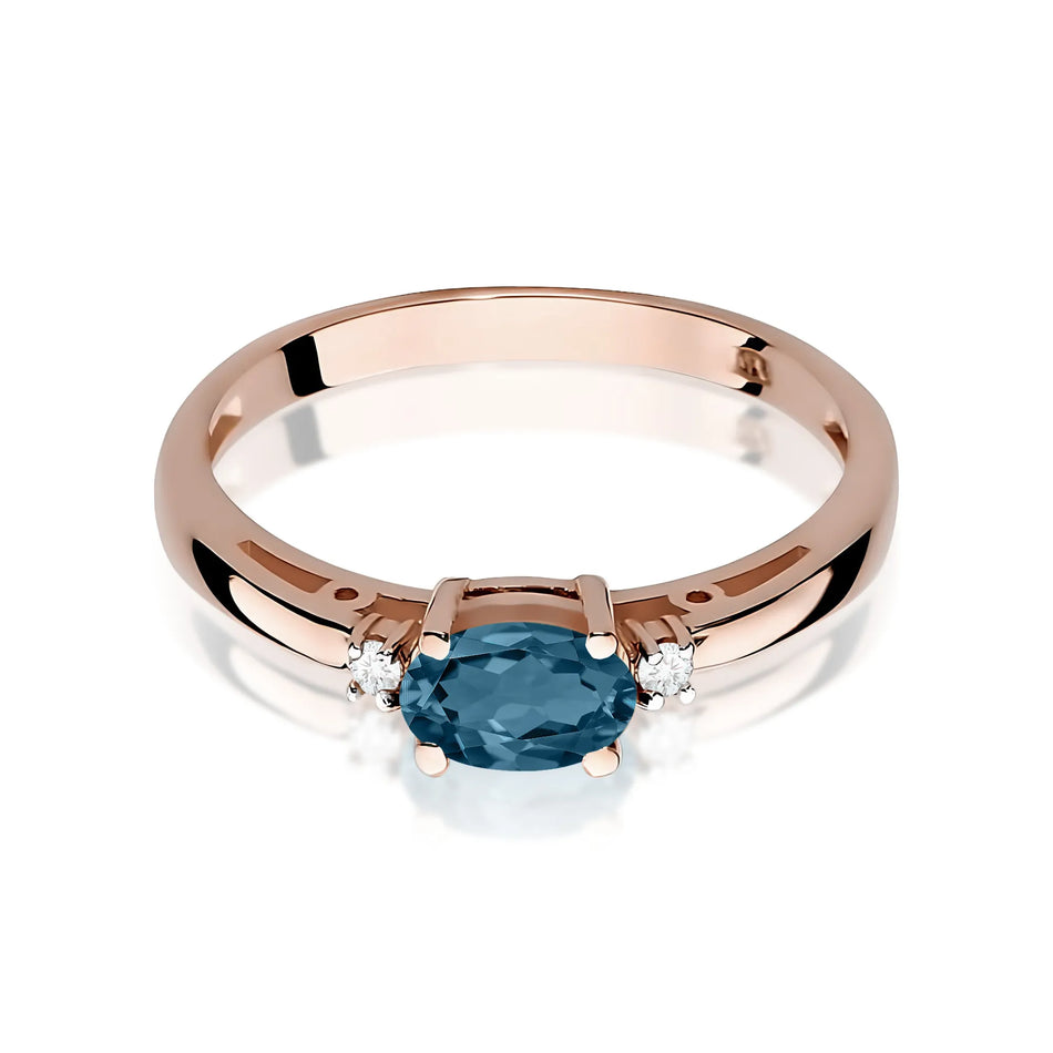 Zlatý prsten s 0,50ct topazem London Blue a 0,029ct diamanty