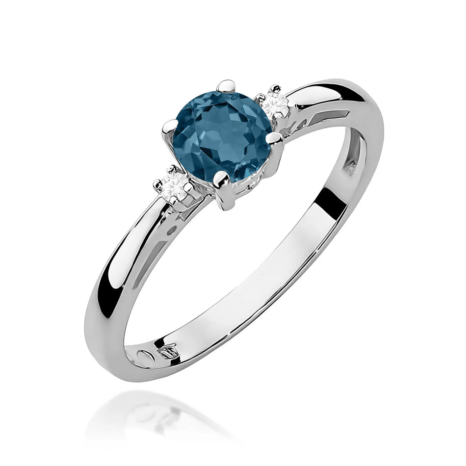 Zlatý prsten s 0,50ct topazem London Blue a 0,029ct diamanty