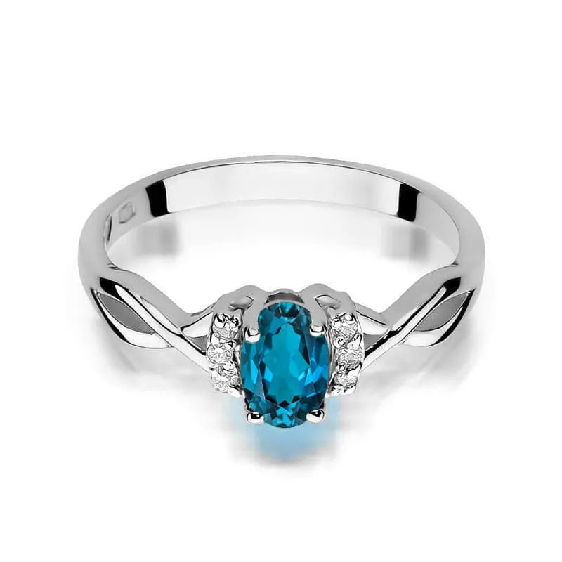 Gold Ring with 0.50ct Topaz London Blue and 0.052ct Diamonds
