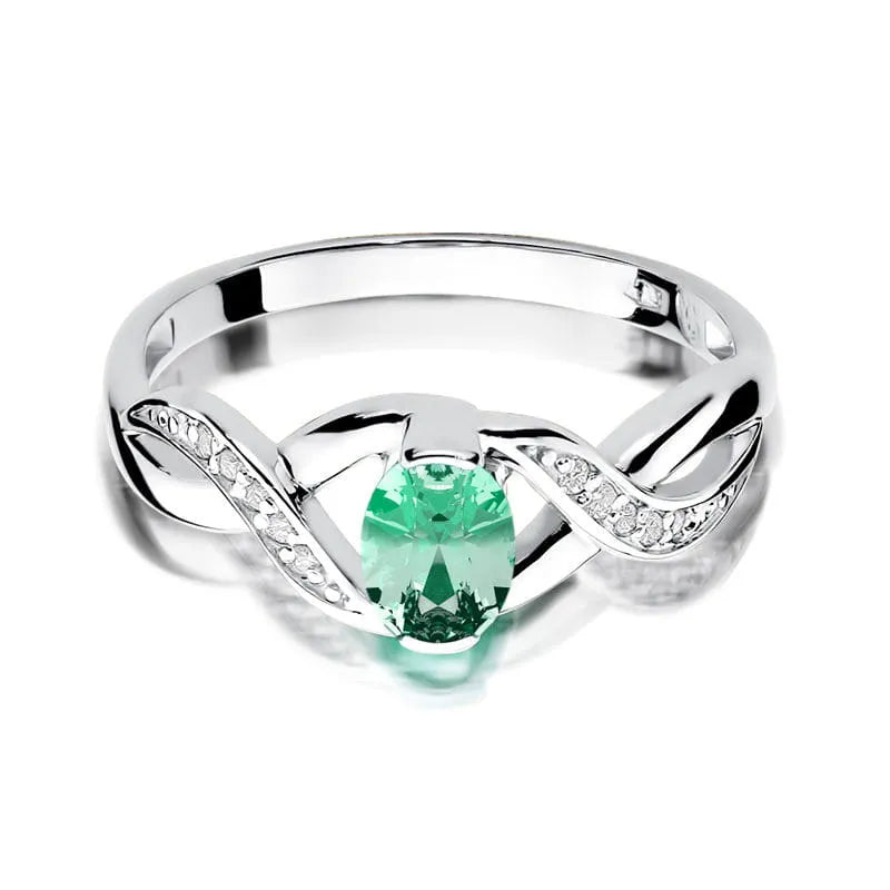 Zlatý prsten se smaragdem 0,40 ct a diamanty 0,05 ct