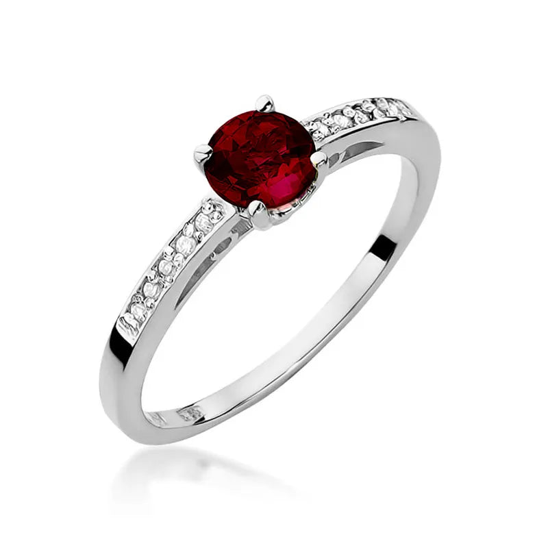 Zlatý prsten s 0,60ct granátem a 0,05ct diamanty