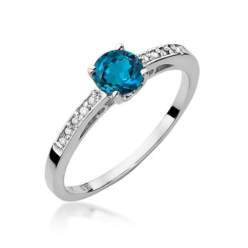 Gold Ring with 0.50ct Topaz London Blue and 0.05ct Diamonds