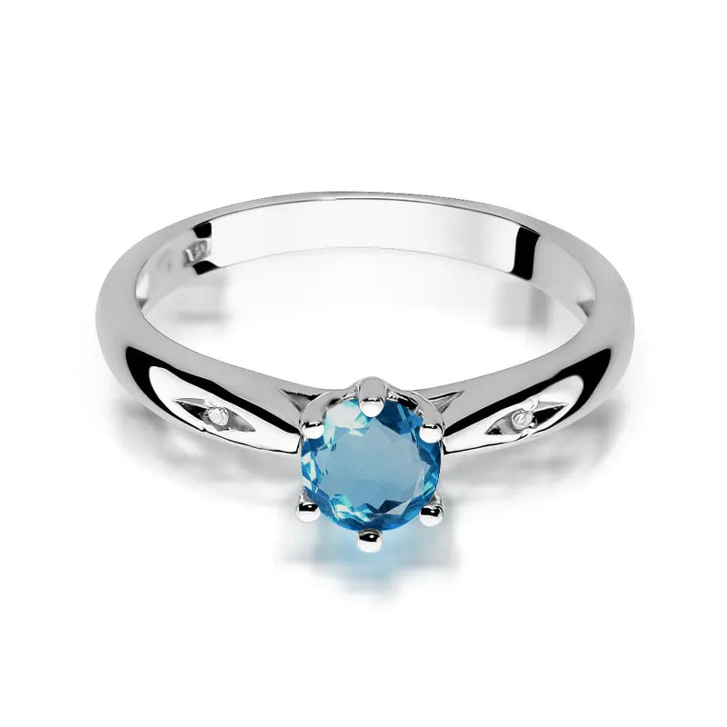 Zlatý prsten s 0,50ct topazem London Blue a 0,01ct diamanty