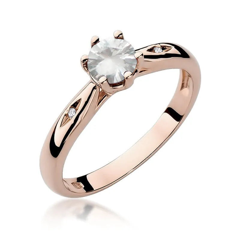 Zlatý prsten s 0,60ct bílým safírem a 0,01ct diamanty