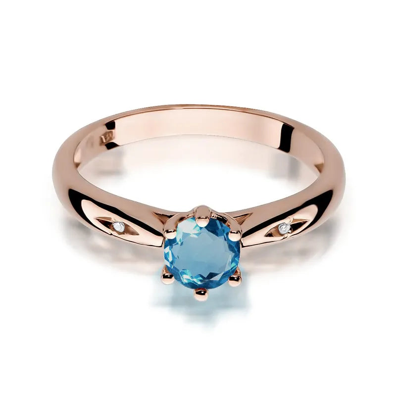 Zlatý prsten s 0,50ct topazem London Blue a 0,01ct diamanty