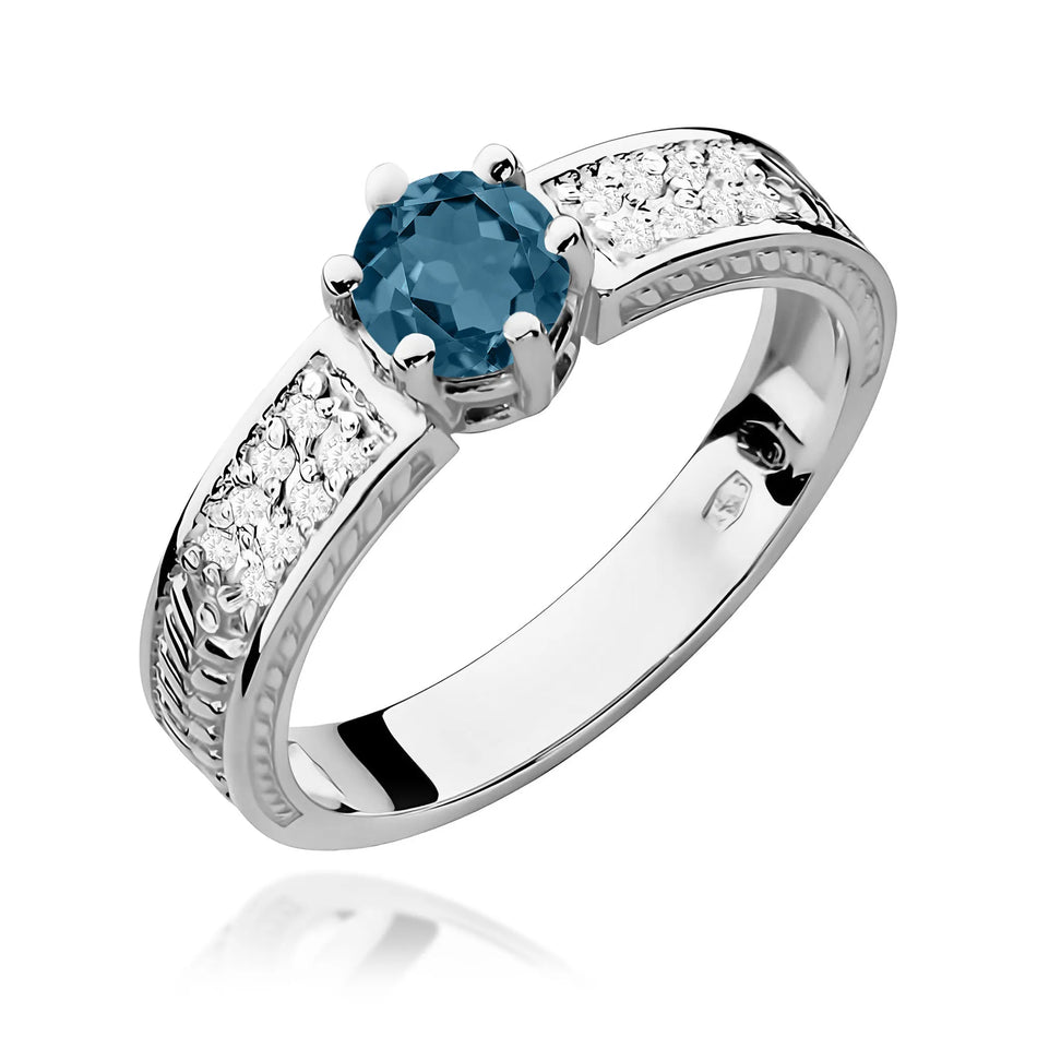 Zlatý prsten s 0,50ct topazem London Blue a 0,08ct diamanty
