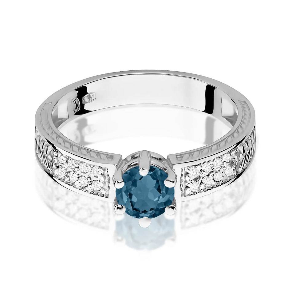 Zlatý prsten s 0,50ct topazem London Blue a 0,08ct diamanty