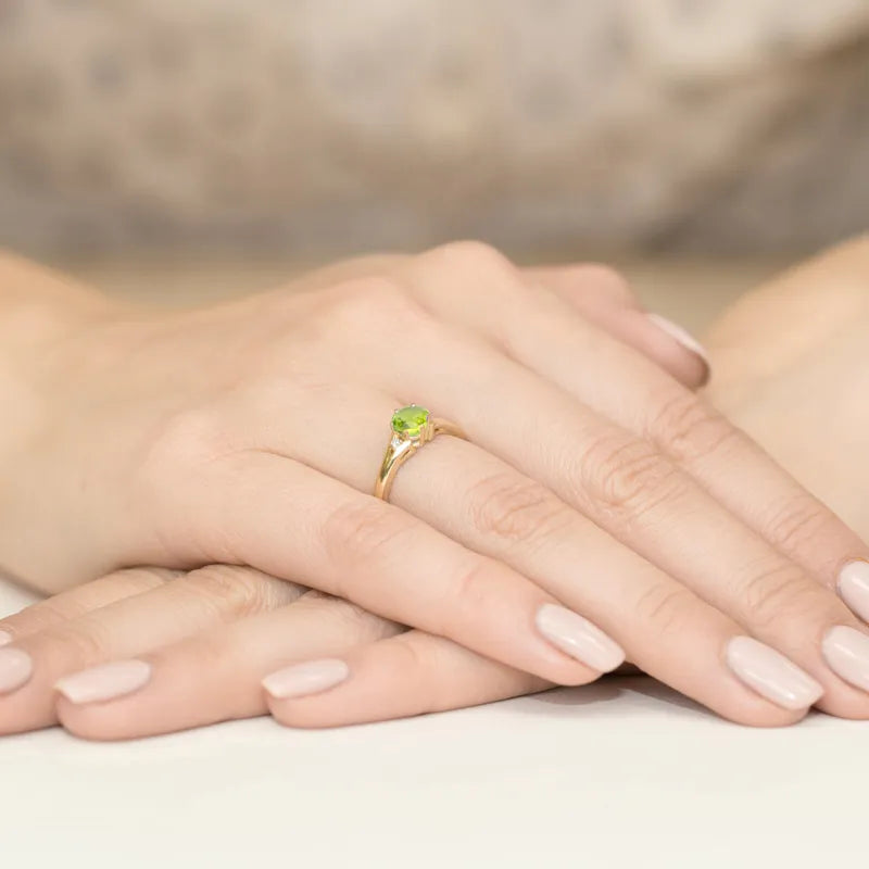 Gold Ring with 0.60ct Olivine and Diamonds