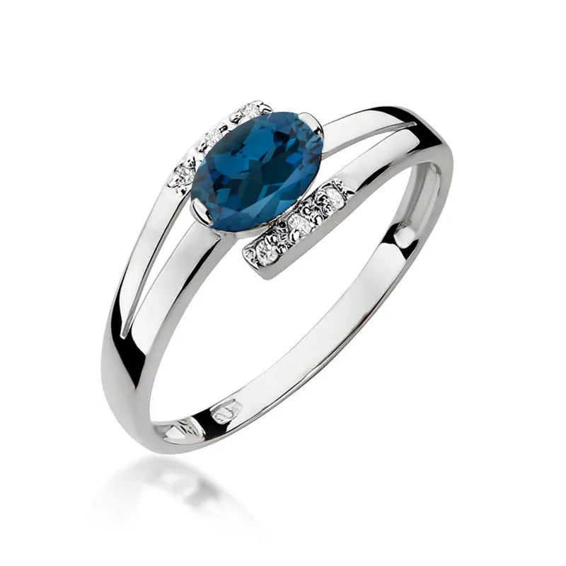 Zlatý prsten s 0,50ct topazem London Blue a 0,052ct diamanty