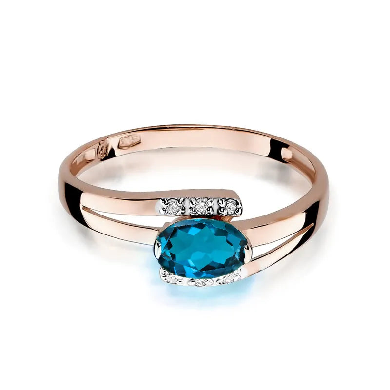 Zlatý prsten s 0,50ct topazem London Blue a 0,052ct diamanty