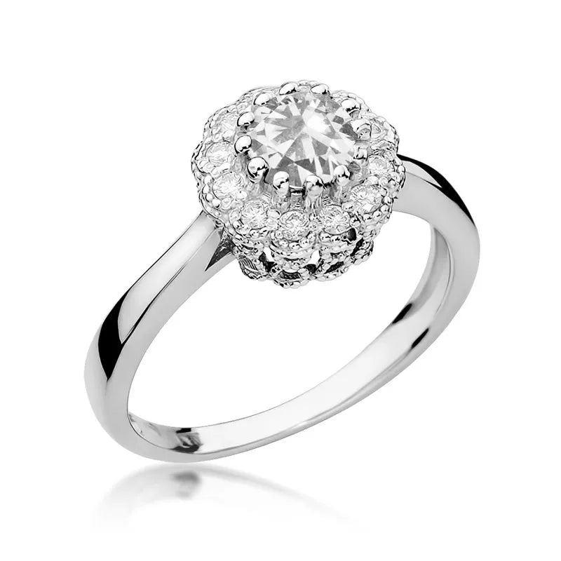 Zlatý prsten s 0,60ct bílým safírem a 0,174ct diamanty