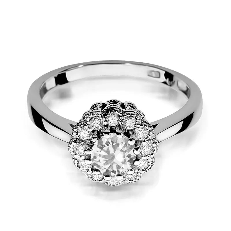 Zlatý prsten s 0,60ct bílým safírem a 0,174ct diamanty