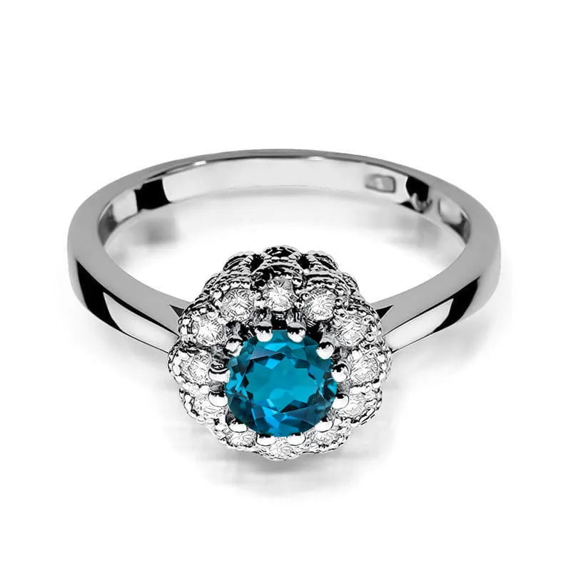 Gold Ring with 0.50ct Topaz London Blue and 0.174ct Diamonds
