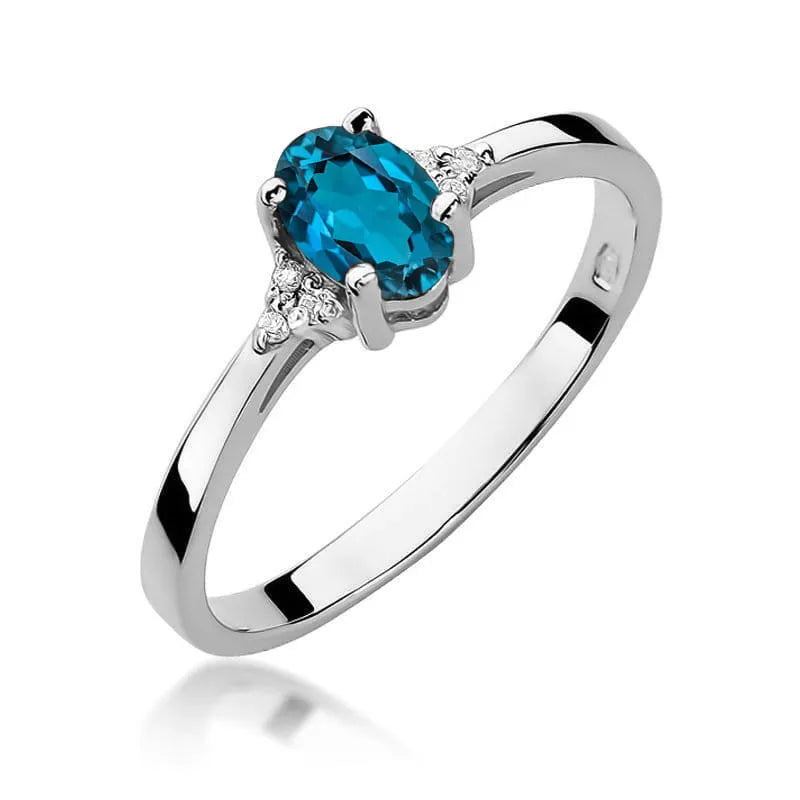 Gold Ring with 0.50ct Topaz London Blue and 0.052ct Diamonds