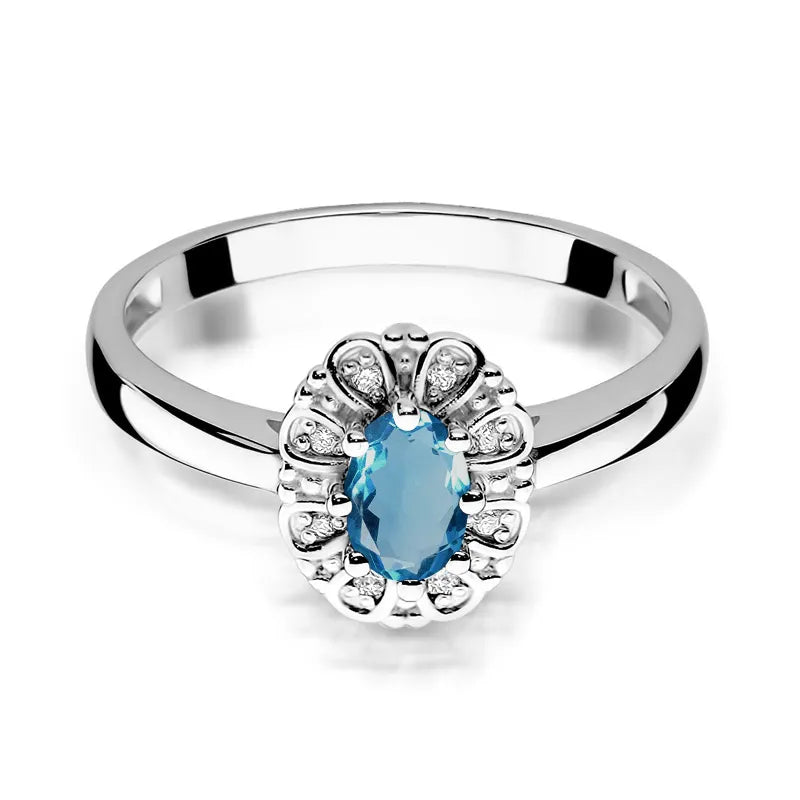 Zlatý prsten s 0,50ct topazem London Blue a 0,069ct diamanty