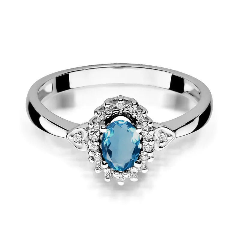Zlatý prsten s 0,50ct topazem London Blue a 0,10ct diamanty