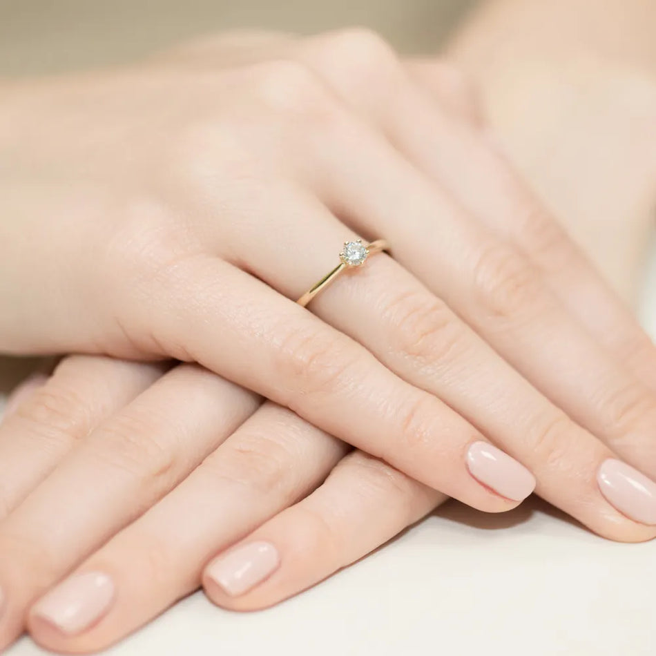 Zlatý prsten s diamantem 0,15 ct