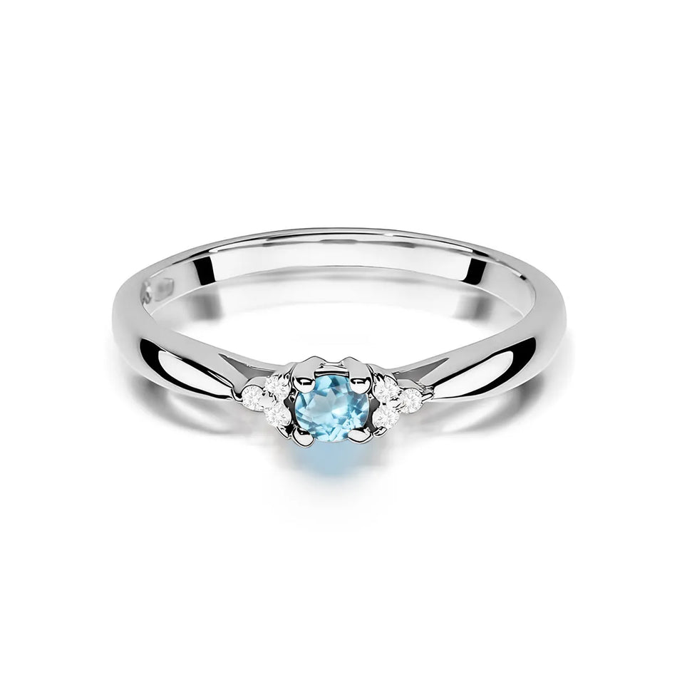 Zlatý prsten s topazem 0,15 ct a diamanty 0,03 ct