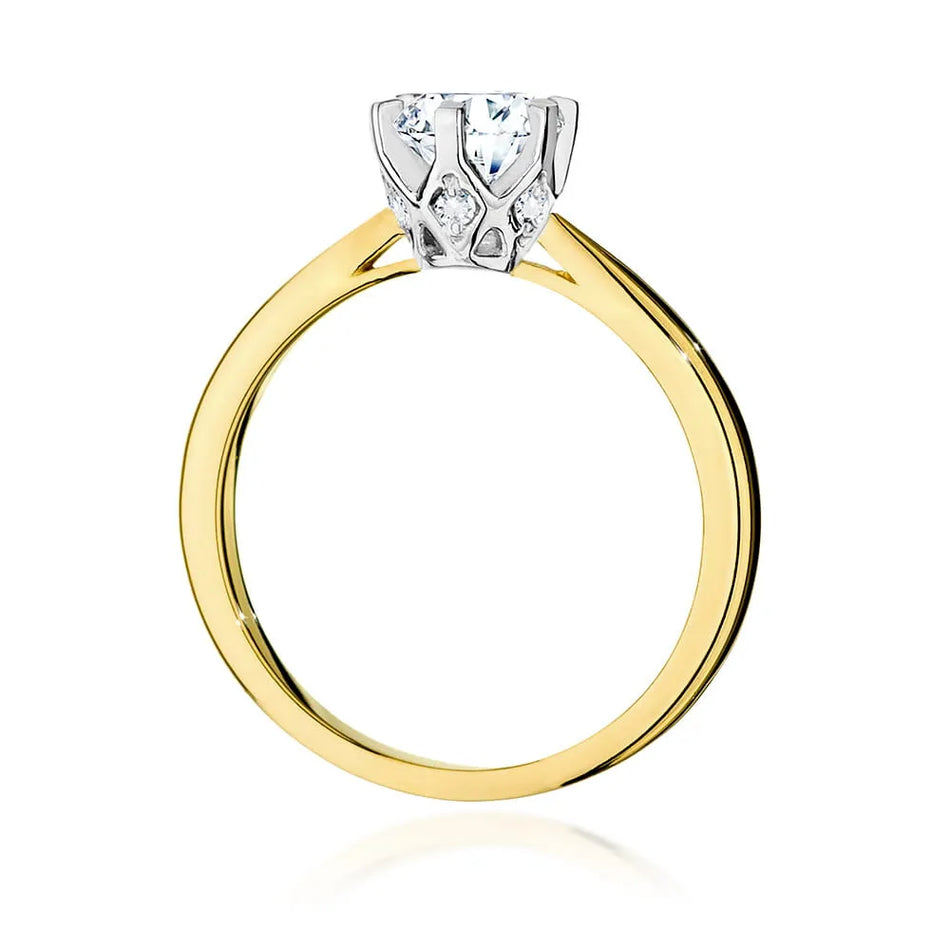 Gold Ring with 0.70ct Diamond and 0.06ct Sideline Diamonds