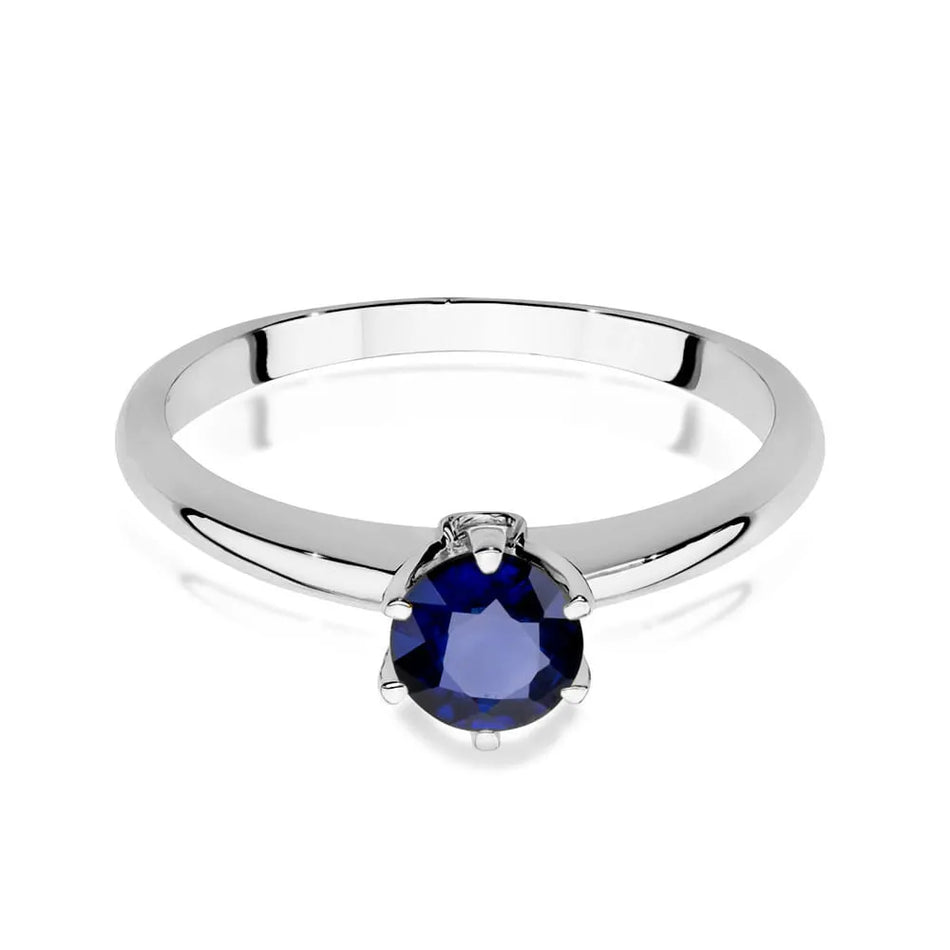 Gold ring with sapphire and diamonds