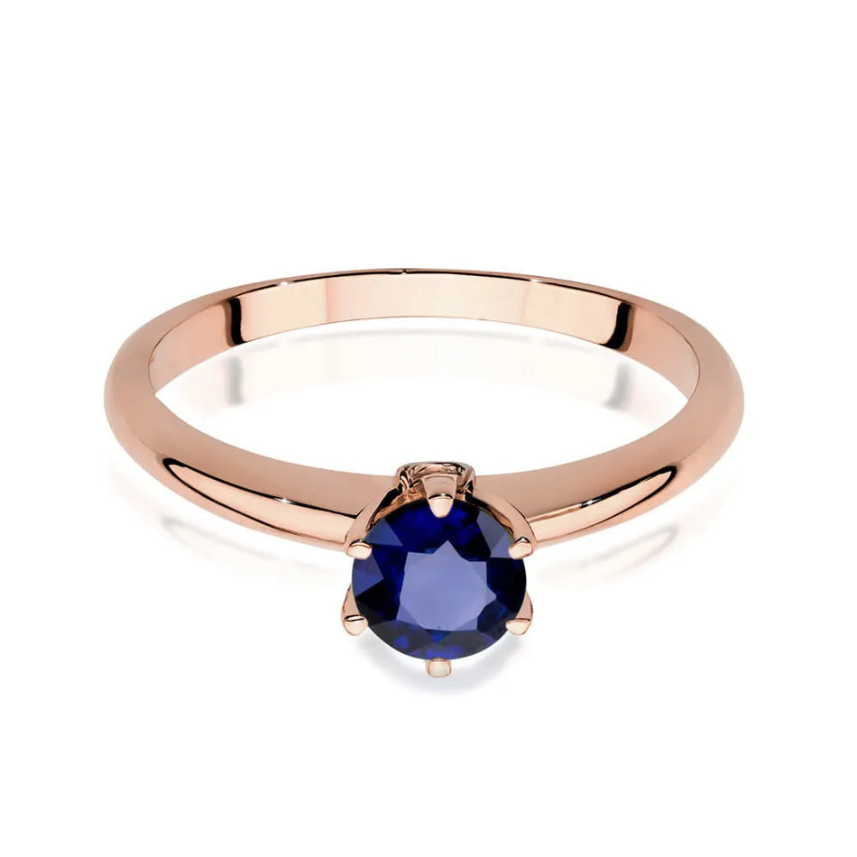 Gold ring with sapphire and diamonds