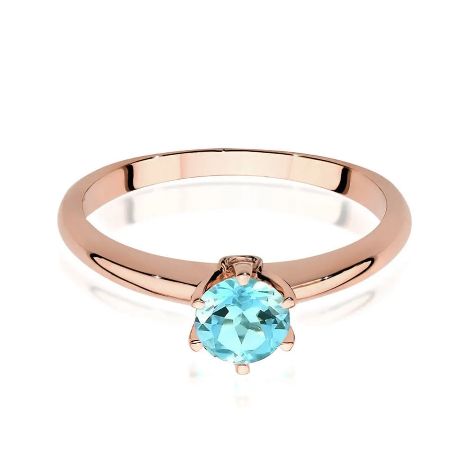 Gold ring with topaz and diamonds