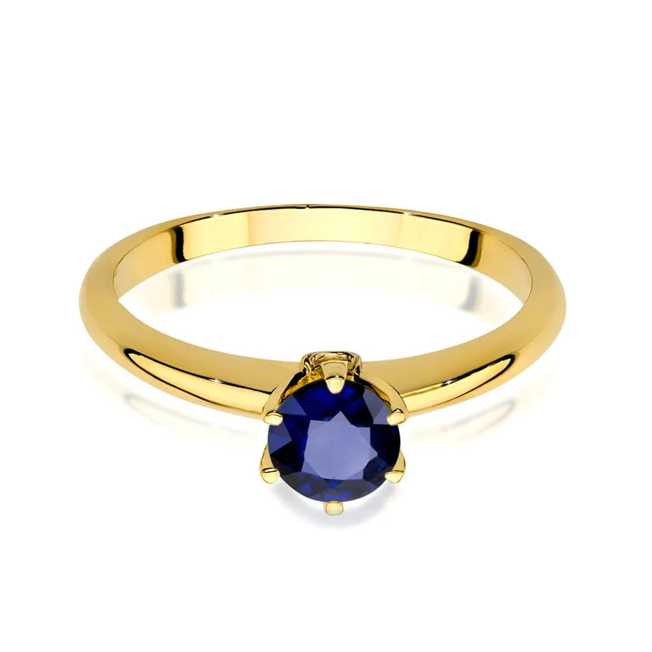 Gold ring with sapphire and diamonds