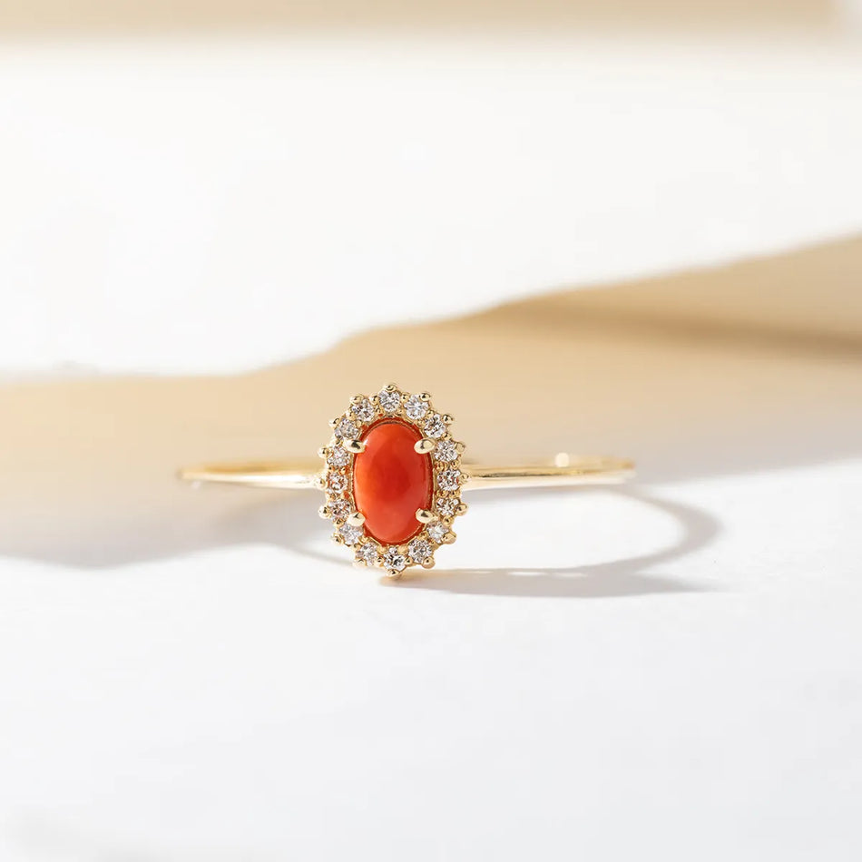 Gold Ring with 0.20ct Coral and 0.08ct Sideline Diamonds