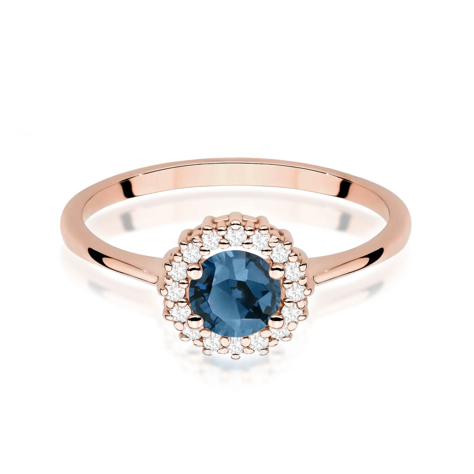 Gold ring with 0.50ct London Blue topaz and diamonds Flower