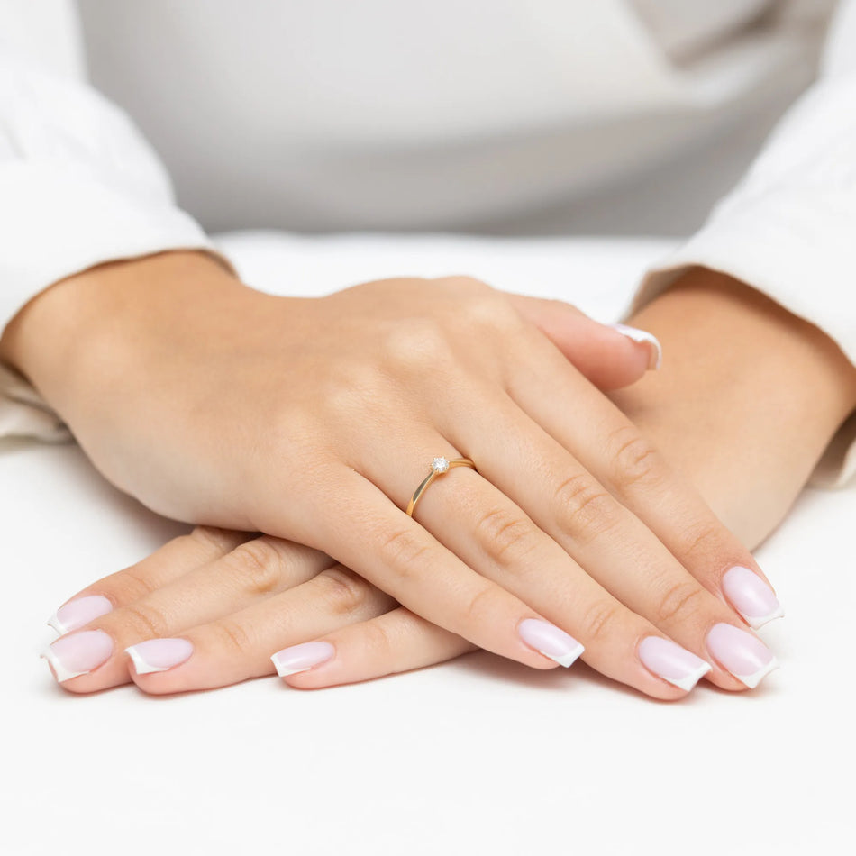 Zlatý prsten s diamantem 0,15 ct