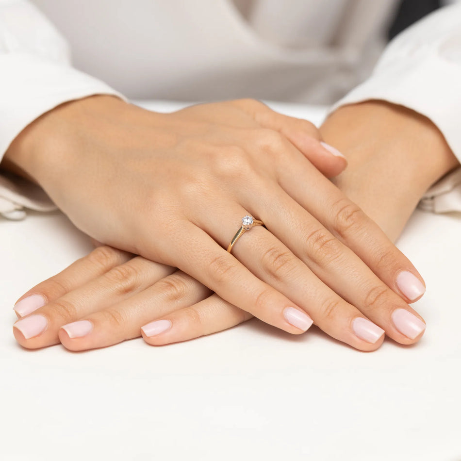 Zlatý prsten s diamantem 0,18 ct