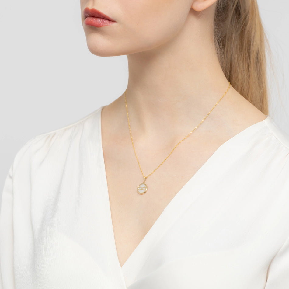 Gold Pendant Circle with Mother-of-Pearl Infinity Symbol
