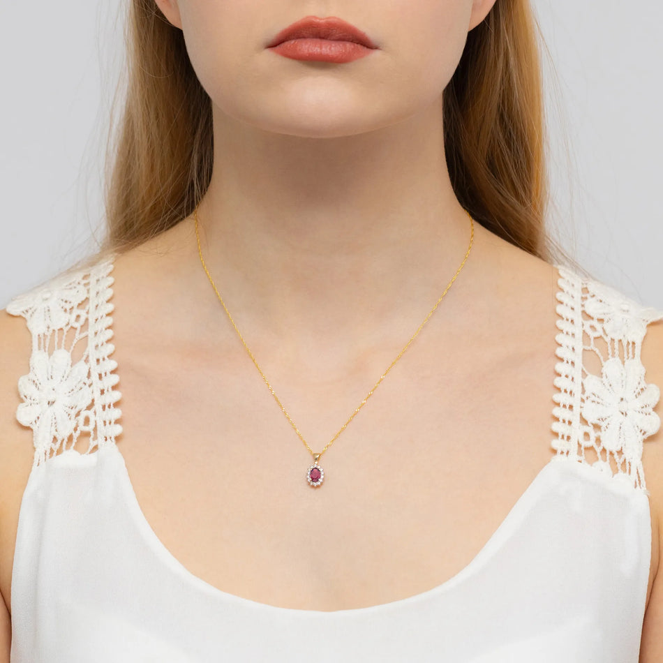 Zlatý přívěsek s 0,60ct rubínem a 0,12ct diamanty