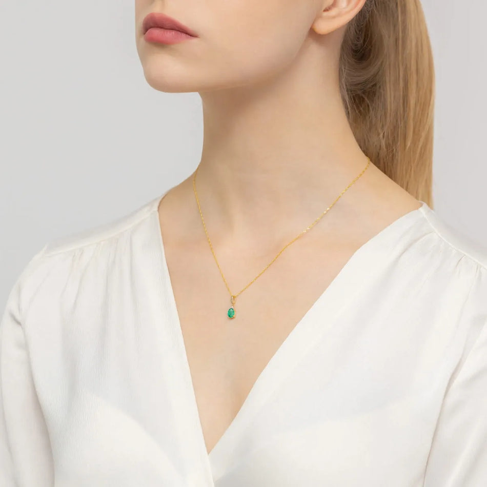 Zlatý přívěsek s 0,80ct smaragdem a 0,026ct diamanty