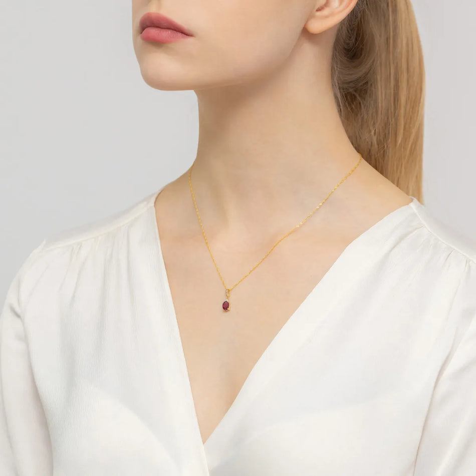 Zlatý přívěsek s 1.00ct rubínem a 0.026ct diamanty