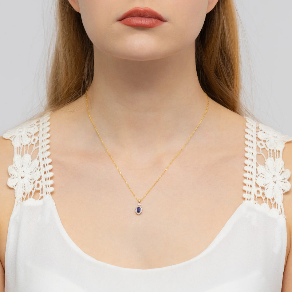 Zlatý přívěsek s 0,70ct safírem a 0,095ct diamanty